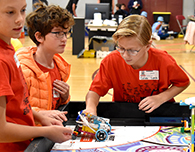  Singing Hills students participate in the FIRST Lego League competition at Chatfield High School.